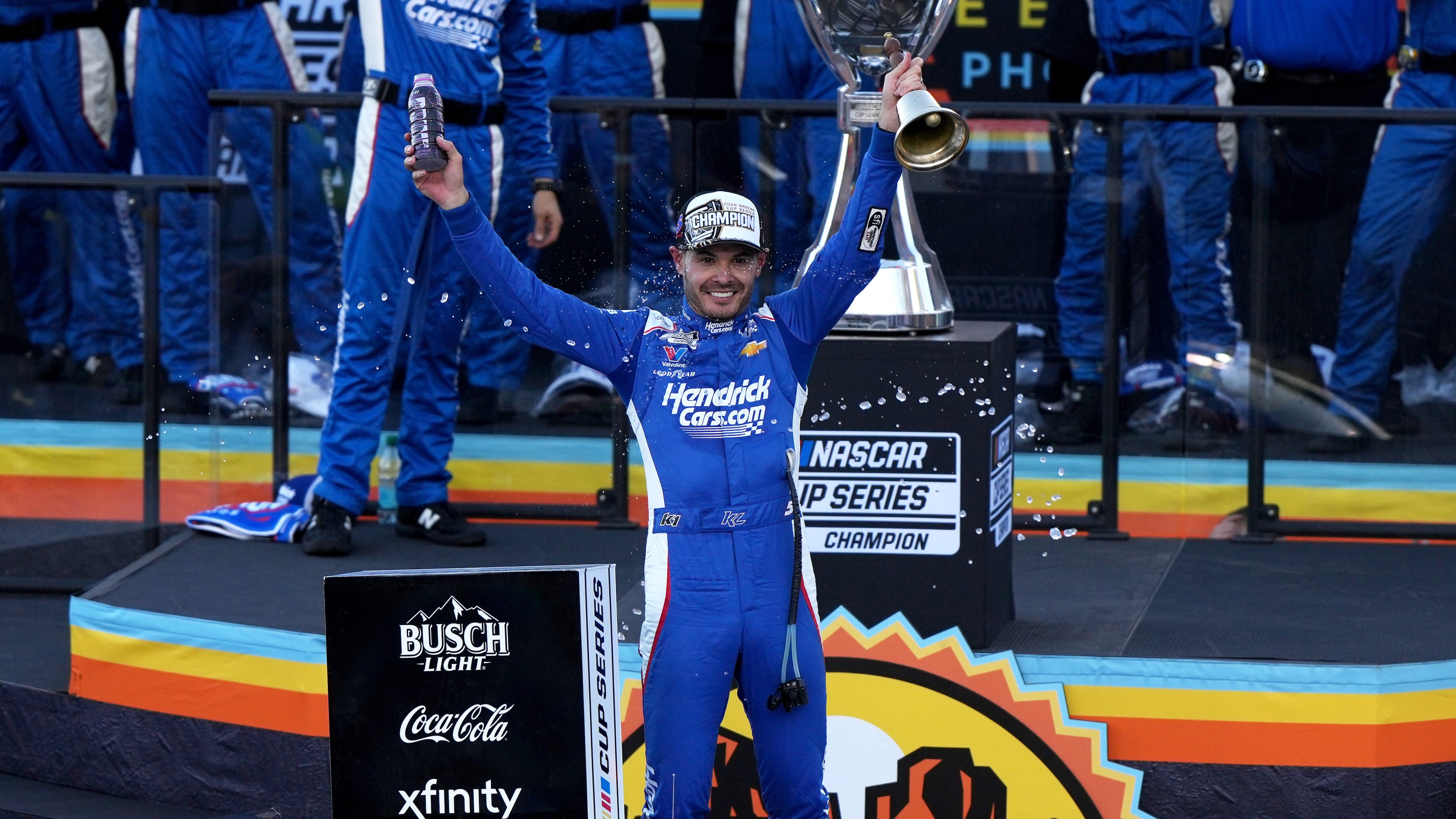 Kyle Larson celebrates after winning the NASCAR Cup Series championship Sunday, Nov. 2, 2025, in Avondale, Ariz. (AP Photo/Rick Scuteri)