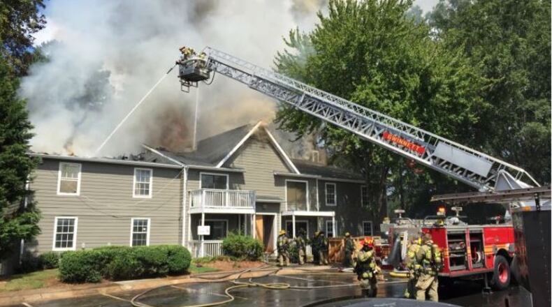 A vacant apartment building in Norcross suffered heavy damage in a Wednesday fire. (BRANDEN CAMP / SPECIAL)