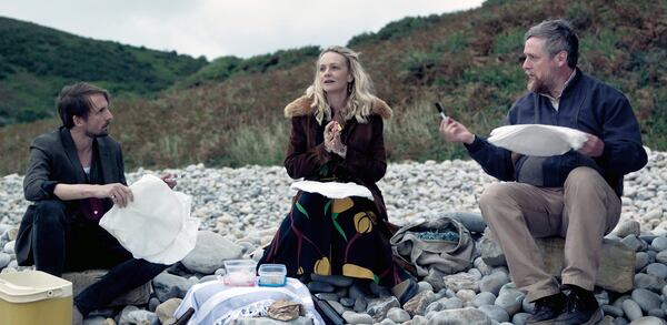 This image released by Focus Features shows Tom Basden, from left, Carey Mulligan and Tim Key in a scene from "The Ballad of Wallis Island." (Focus Features via AP)
