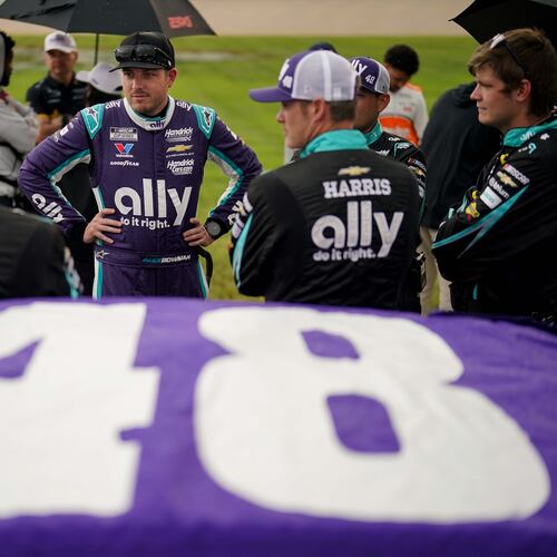 Alex Bowman, center, stands with his team before a NASCAR Cup Series auto race, Sunday, May 31, 2026, in Lebanon, Tenn. (AP Photo/Camden Hall)