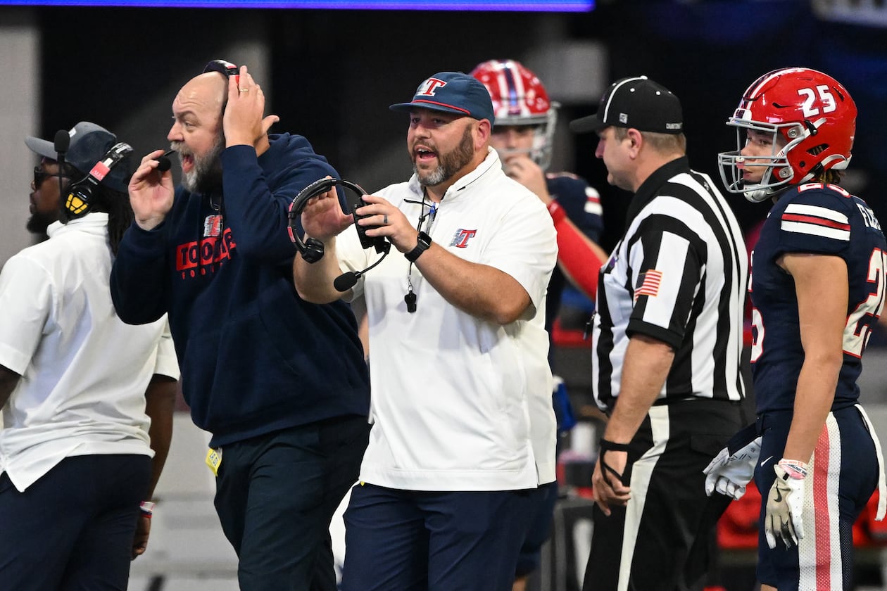 Toombs County and coach Buddy Martin (center) — pictured during last season's Class A Division I championship game — continue their bid for a repeat when they host Thomasville on Friday in the second round. Toombs is ranked No. 2 and Thomasville is No. 5. (Hyosub Shin/AJC 2024)