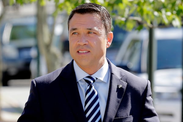 FILE — Former Rep. Michael Grimm arrives to his polling site in the Staten Island borough of New York, June 26, 2018. (AP Photo/Seth Wenig, File)