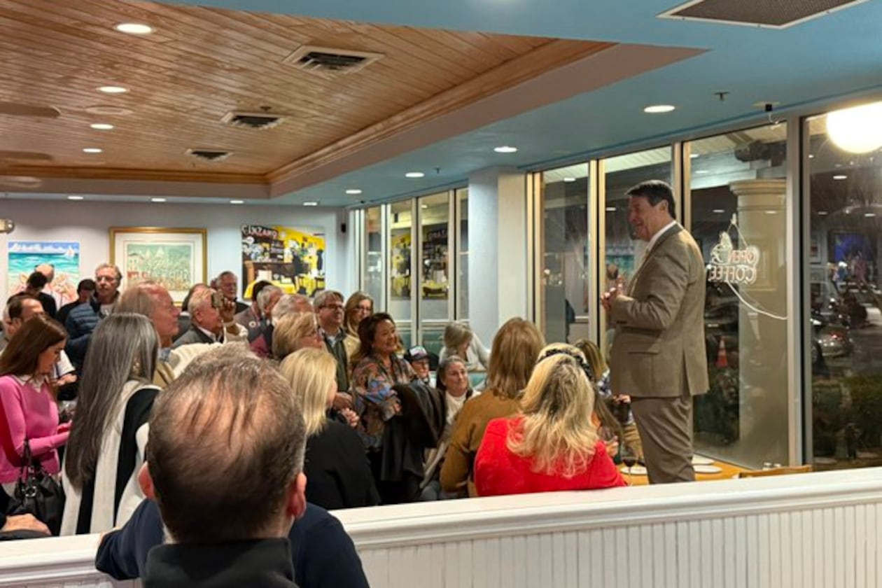 Sandy Springs Mayor Rusty Paul spoke to supporters after winning his reelection bid on Tuesday. (Greg Bluestein/AJC)