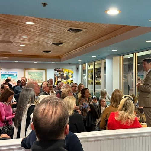 Sandy Springs Mayor Rusty Paul spoke to supporters after winning his reelection bid on Tuesday. (Greg Bluestein/AJC)