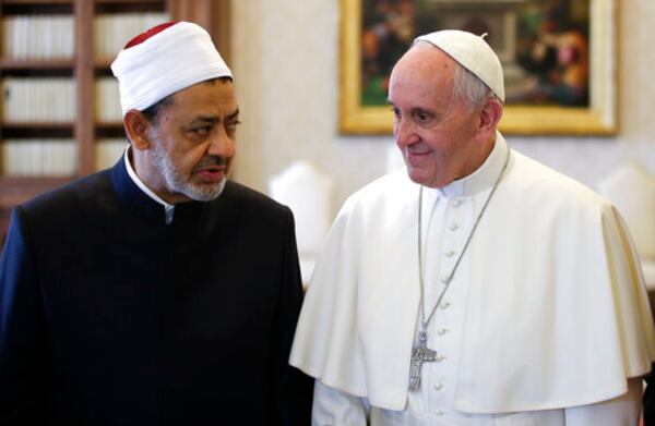 FILE - Sheikh Ahmed el-Tayeb, Grand Imam of Al-Azhar Mosque, left, talks with Pope Francis during a private audience in the Apostolic Palace, at the Vatican, Monday, May 23, 2016. "The meeting is the message.” - Meeting Sheik Ahmed el-Tayeb, the grand imam of Al-Azhar, the prestigious Sunni Muslim center of learning, after a long freeze in relations. (Max Rossi/Pool Photo via AP, File)