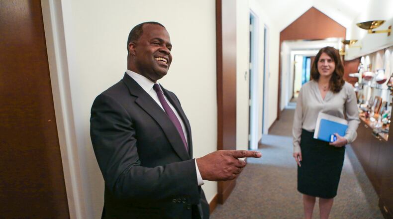 Former Mayor Kasim Reed (left) and press secretary, Jenna Garland, in 2015. JOHN SPINK / JSPINK@AJC.COM