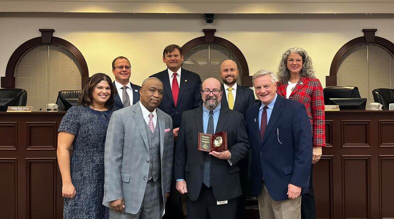 Roswell Mayor Kurt Wilson and City Council members recently recognized Danny Blitch, Manager of the city’s Grants Division, for being inducted into the Grant Professionals Association Distinguished Fellows Class of 2022. COURTESY CITY OF ROSWELL
