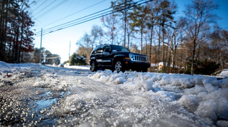 When ice and snow hit metro Atlanta on Friday, part of the state government’s response was coordinated by key officials in the governor’s office while they were 8,500 miles away on a trade mission in South Africa. BRANDEN CAMP