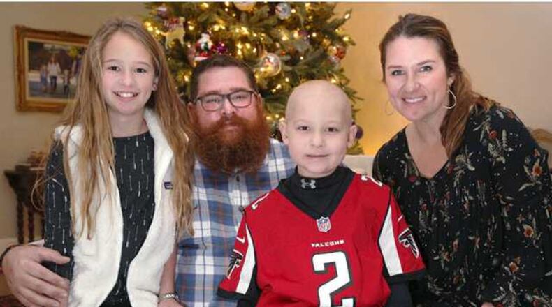 From left, Emma Claire, J.R., Riley and Molly Johnson. (Credit:  Gainesville Times)