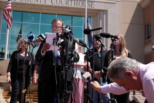 Members of the media cover a press conference outside the Ada County Courthouse as Bryan Kohberger pleaded guilty to murder in the fatal stabbing of four University of Idaho students in 2022 on Wednesday, July 2, 2025, in Boise, Idaho. (AP Photo/Jenny Kane)
