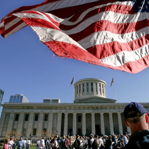 An American flag is outside the state capitol building in Columbus, Ohio, Oct. 25, 2004. (AP Photo/Laura Rauch, File)
