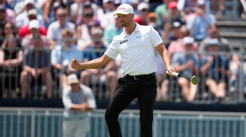 Wyndham Clark celebrates after a birdie on the 12th hole during the second round of the U.S. Open golf tournament at Shinnecock Hills Golf Club in Southampton, N.Y., Friday, June 19, 2026.(AP Photo/David J. Phillip)