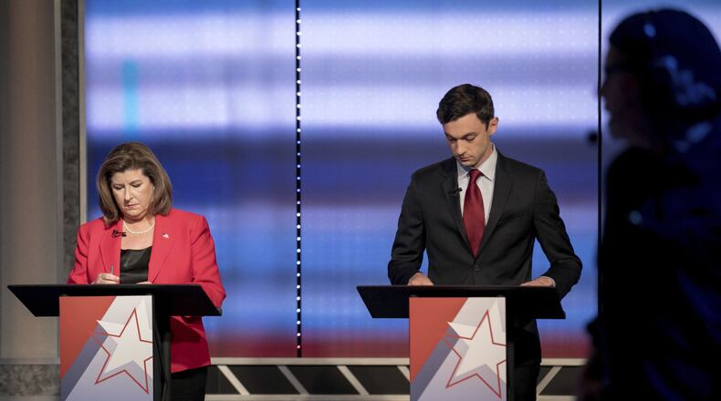 Candidates in Georgia’s 6th Congressional District race Republican Karen Handel, left, and Democrat Jon Ossoff prepare to debate Tuesday, June 6, 2017, in Atlanta. The two meet in a June 20 special election.(Branden Camp/Atlanta Journal-Constitution via AP) AJC FILE PHOTO