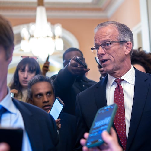 Senate Majority Leader John Thune, R-S.D., pauses in his office doorway to speak to reporters on day 20 of the government shutdown, at the Capitol in Washington, Monday, Oct. 20, 2025. (AP Photo/J. Scott Applewhite)