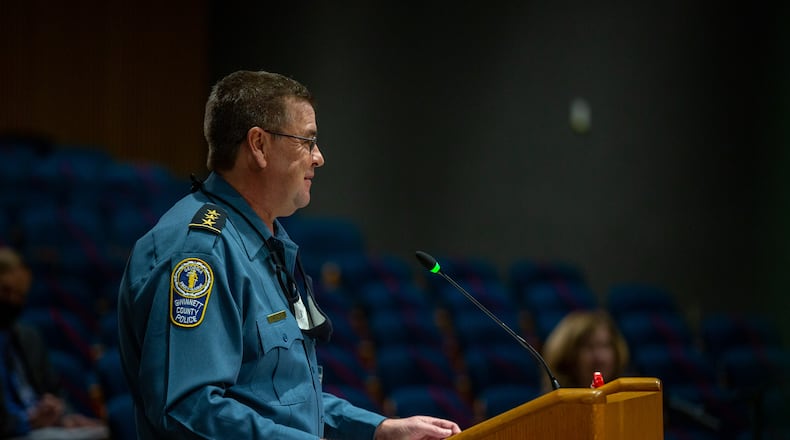 Chief of Police Brett West speaks to the Board of Commissioners. West told leaders Tuesday the department needs more space. (Rebecca Wright for the Atlanta Journal-Constitution) AJC FILE PHOTO