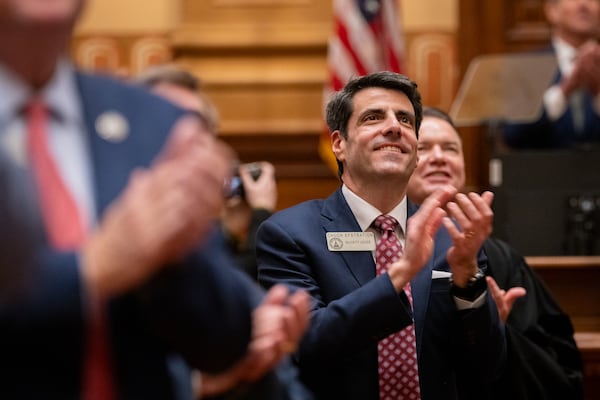 State Rep. Chuck Efstration, R-Mulberry, applauds Gov. Brian Kemp’s final State of the State speech at the Georgia Capitol in January. (Arvin Temkar/AJC)