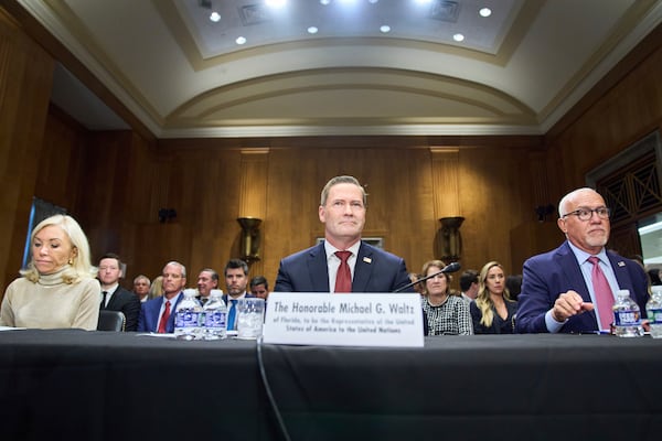 Christine Toretti, left, nominee for U.S. Ambassador to Sweden, former White House National Security Adviser Michael Waltz, nominee for U.S. Representative to the United Nations, and John Arrigo, right, nominee for U.S. Ambassador to Portugal, attend a Senate Foreign Relations Committee nomination hearing, Tuesday, July 15, 2025, on Capitol Hill in Washington. (AP Photo/Jacquelyn Martin)