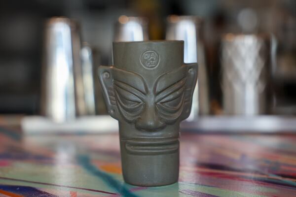 A customer once tried to steal this ceramic tiki mug at Little Bear. (Arvin Temkar/AJC)