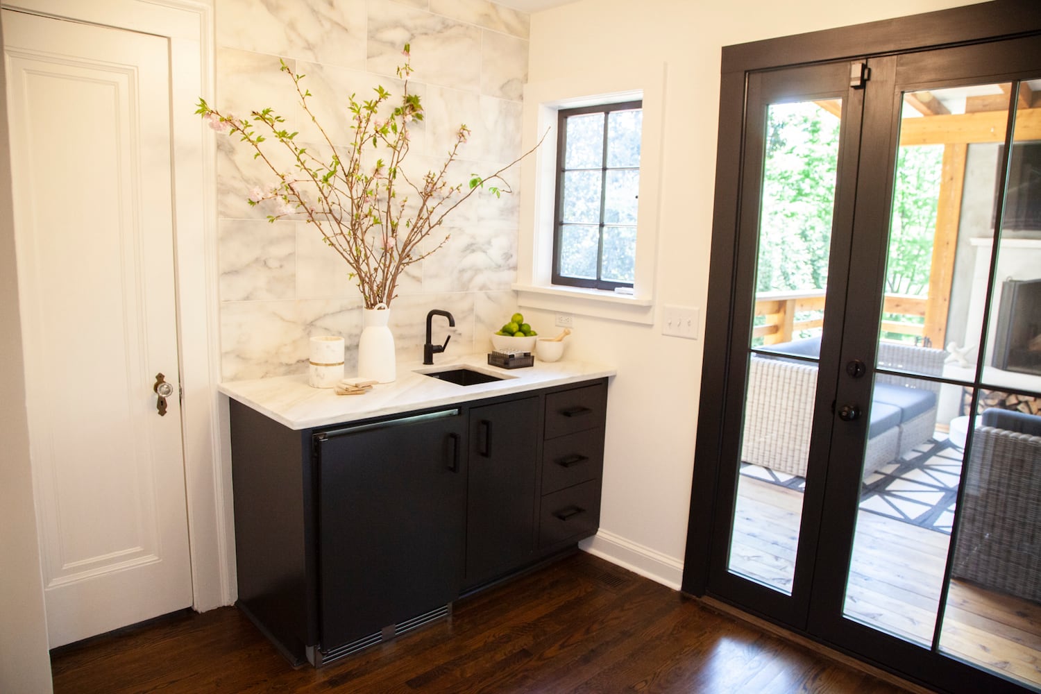 Photos: Atlanta couple downsize to a Tudor-style home with modern lounge, spacious deck