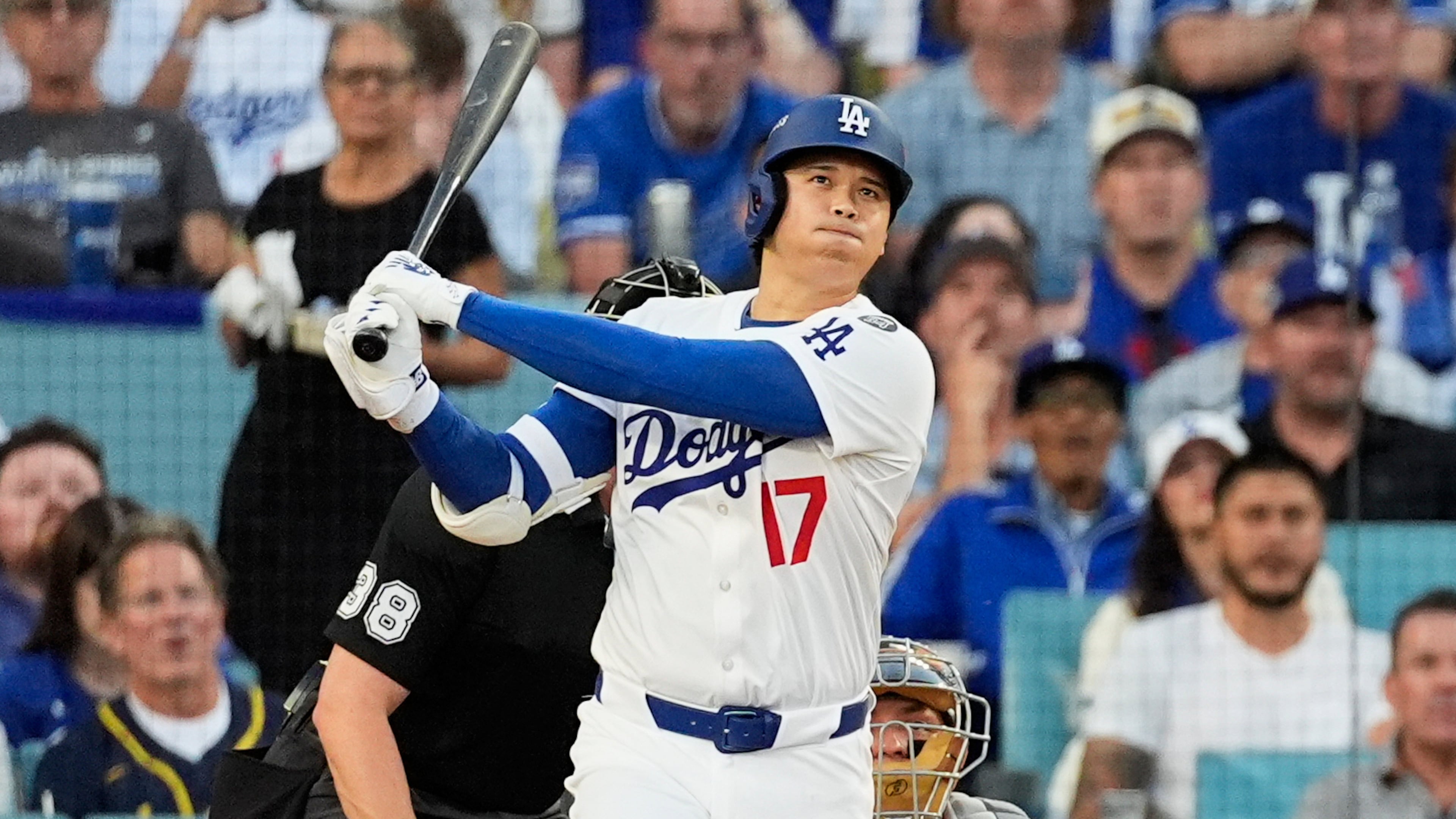 FILE - Los Angeles Dodgers' Shohei Ohtani watches his home run during the first inning against the Milwaukee Brewers in Game 4 in baseball's National League Championship Series, Friday, Oct. 17, 2025, in Los Angeles. (AP Photo/Mark J. Terrill, File)