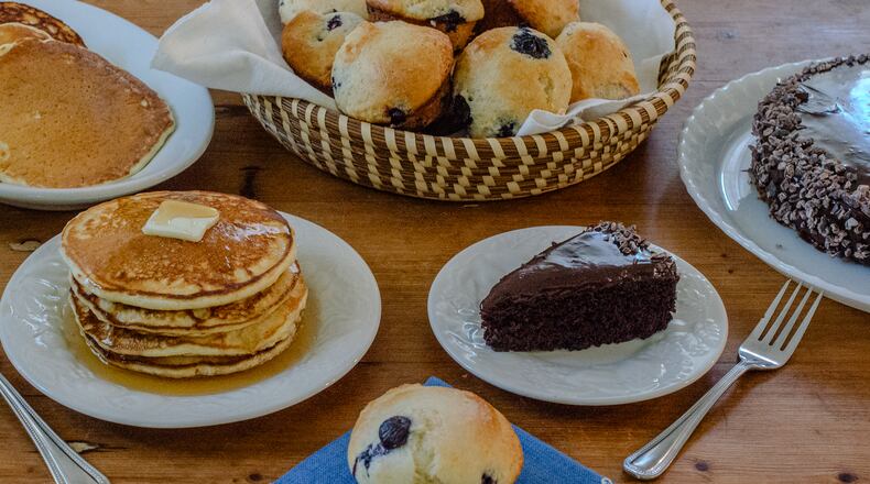 This trio of eggless baking recipes includes (from left) Flaxseed Pancakes, Aquafaba Blueberry Lemon Muffins and Wacky Cake. (Virginia Willis for The Atlanta Journal-Constitution)