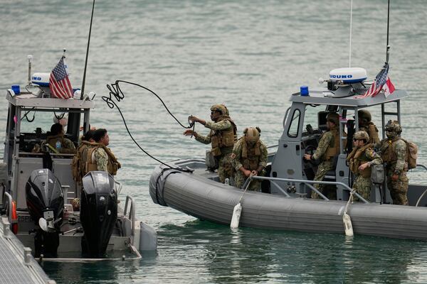 U.S. and Panamanian military forces conduct a joint drill at the Panama Canal during the visit of U.S. Defense Secretary Pete Hegseth to Port of Rodman in West Panama, Tuesday, April 8, 2025. (AP Photo/Matias Delacroix)