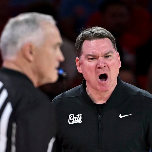 Arizona head coach Tommy Lloyd, right, reacts during the first half of an NCAA college basketball game against Houston, Saturday, Feb. 21, 2026, in Houston. (AP Photo/Maria Lysaker)