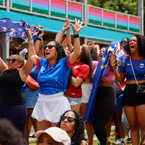 Cape Verde fans celebrate following a 0-0 draw at FIFA Fan Festival in Centennial Olympic Park during the Spain and Cape Verde match at the 2026 FIFA World Cup in Atlanta on June 15, 2026. It’s the first of eight World Cup matches to take place in Atlanta. It’s Cape Verde’s first World Cup. (Arvin Temkar/AJC)