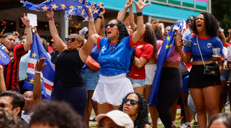 Cape Verde fans celebrate following a 0-0 draw at FIFA Fan Festival in Centennial Olympic Park during the Spain and Cape Verde match at the 2026 FIFA World Cup in Atlanta on June 15, 2026. It’s the first of eight World Cup matches to take place in Atlanta. It’s Cape Verde’s first World Cup. (Arvin Temkar/AJC)