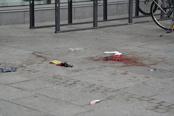 Bloodstains are seen outside the Ratina shopping centre in Tampere, Finland, Thursday July 3, 2025, after several people were stabbed. (Saara Peltola/Lehtikuva via AP)