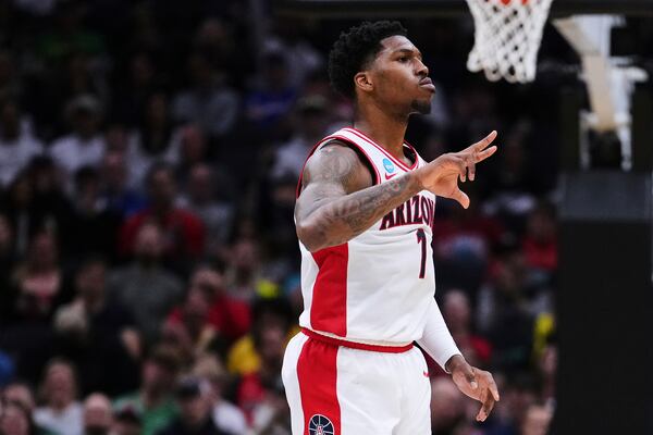 Arizona guard Caleb Love reacts after a basket against Oregon during the second half in the second round of the NCAA college basketball tournament, Sunday, March 23, 2025 in Seattle. (AP Photo/Lindsey Wasson)