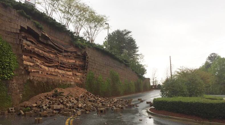 Atlanta weather caused a retaining wall to crumble near a Publix in Forsyth County on Wednesday.