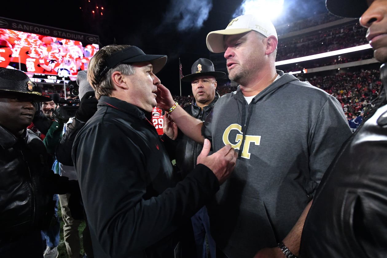 Kirby Smart (left) and Georgia beat Brent Key and Georgia Tech 44-42 in eight overtimes last November in Athens. The Bulldogs and Yellow Jackets bring Clean Old-Fashioned Hate off campus for 2025, playing at 3:30 p.m. Friday at Mercedes-Benz Stadium in Atlanta. (Hyosub Shin/AJC 2024)