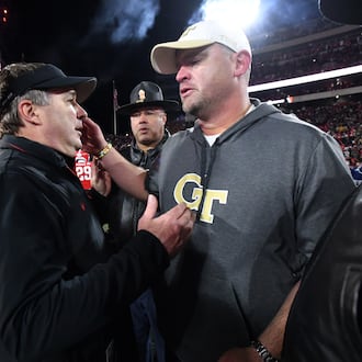 Kirby Smart (left) and Georgia beat Brent Key and Georgia Tech 44-42 in eight overtimes last November in Athens. The Bulldogs and Yellow Jackets bring Clean Old-Fashioned Hate off campus for 2025, playing at 3:30 p.m. Friday at Mercedes-Benz Stadium in Atlanta. (Hyosub Shin/AJC 2024)
