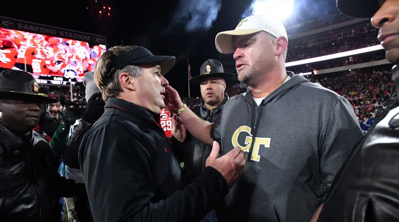 Kirby Smart (left) and Georgia beat Brent Key and Georgia Tech 44-42 in eight overtimes last November in Athens. The Bulldogs and Yellow Jackets bring Clean Old-Fashioned Hate off campus for 2025, playing at 3:30 p.m. Friday at Mercedes-Benz Stadium in Atlanta. (Hyosub Shin/AJC 2024)