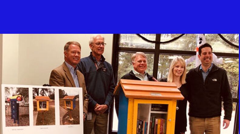Community members and the Rotary Club of North Fulton announce four new “Little Free Libraries” to be installed in Alpharetta parks. CITY OF ALPHARETTA