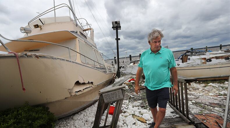 A resident of the St. Marys area along the Georgia coast, Jay Lassiter surveys the remains of boats and docks there after they were destroyed by Hurricane Irma in September of 2017. Irma was one of three hurricanes that year that damaged Georgia enough to draw federal grants to local health centers. (PHOTO by Curtis Compton/ccompton@ajc.com)