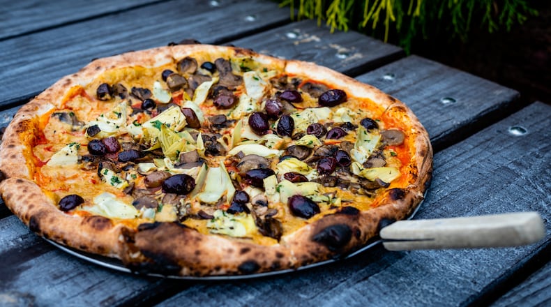Many never would suspect that the Sottaceto pizza from Ammazza is vegan. Henri Hollis/henri.hollis@ajc.com