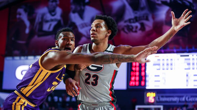 Georgia center Braelen Bridges (23) calls for the ball as LSU's Shawn Phillips defends during an SEC game Stegeman Coliseum in Athens on Tuesday, Feb. 14, 2023. (Photo by Tony Walsh/UGA Athletics)