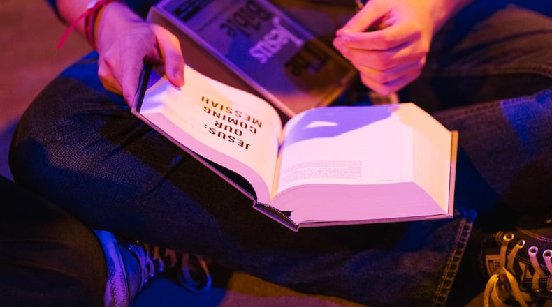 Taken on Mon, Jan. 2, 2017 An early copy of The Jesus Bible (Passion Publishing, Zondervan) was given to each Passion-goer. Releasing Jan. 3, The Jesus Bible is filled with 66 book introductions, over 1,000 articles and seven compelling essays by Giglio who served as the general editor, alongside Max Lucado, John Piper, Ravi Zacharias and Randy Alcorn, helping readers follow the thread of Jesus from cover to cover. PHOTO BY ANDY BROPHY