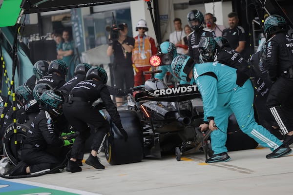 Mercedes driver George Russell of Britain makes a pit stop during the Formula One Miami Grand Prix auto race Sunday, May 4, 2025, in Miami Gardens. Fla. (Shawn Thew/Pool Photo via AP)