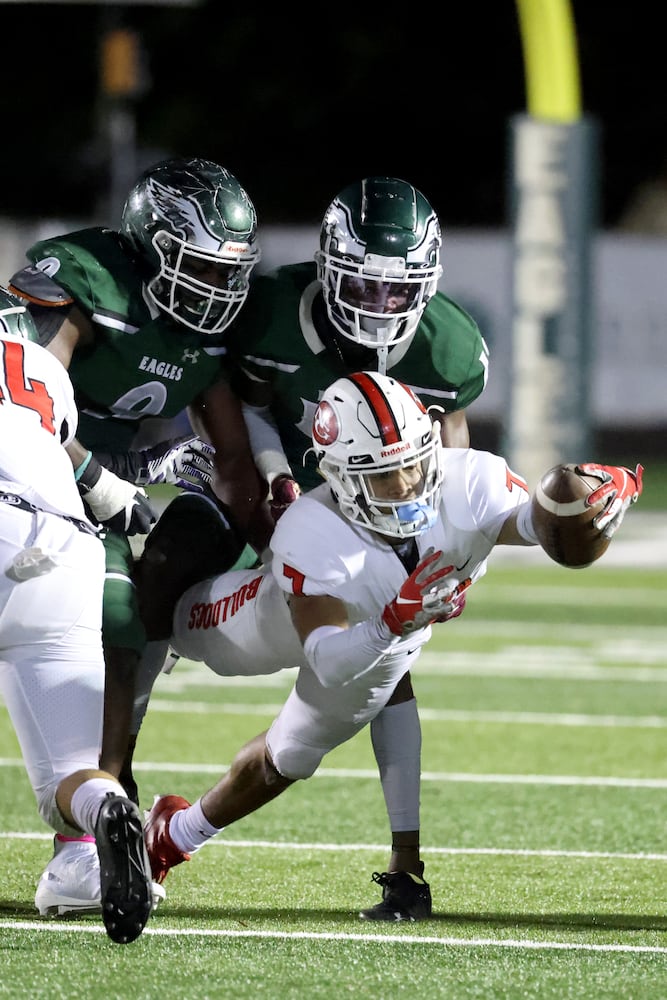 North Gwinnett wide receiver Jordan Hancock (7) dives for extra yards. JASON GETZ FOR THE ATLANTA JOURNAL-CONSTITUTION