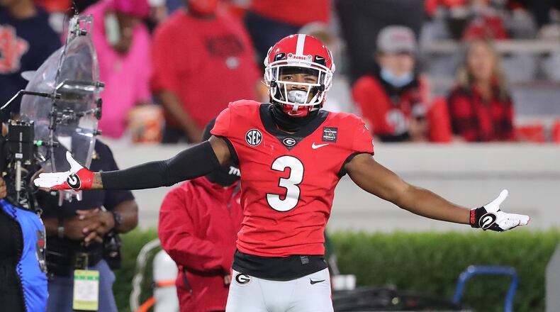 100320 Athens: Georgia defensive back Tyson Campbell breaks up a Auburn pass in a SEC college football game on Saturday, Oct 3, 2020 in Athens.   “Curtis Compton / Curtis.Compton@ajc.com”
