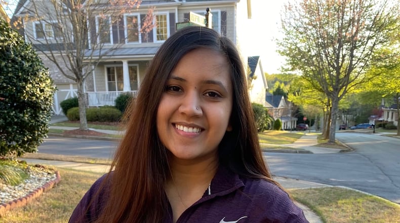 Hiral Patel, a second-year medical student at PCOM Georgia, delivers groceries to seniors and medically fragile individuals as part of a volunteer program she and other medical students began to help the community. (Courtesy COVID Captains)