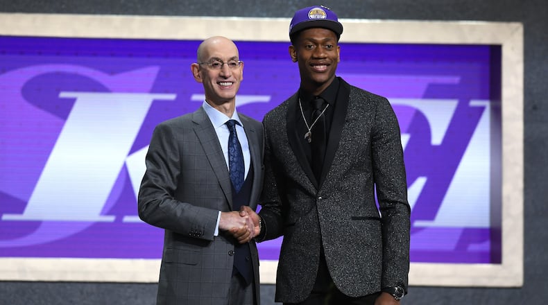De'Andre Hunter poses with NBA Commissioner Adam Silver after being drafted with the fourth overall pick by the Los Angeles Lakers during the 2019 NBA Draft at the Barclays Center on June 20, 2019 in the Brooklyn borough of New York City. NOTE TO USER: User expressly acknowledges and agrees that, by downloading and or using this photograph, User is consenting to the terms and conditions of the Getty Images License Agreement. (Photo by Sarah Stier/Getty Images)