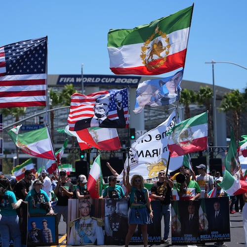 People protest outside Los Angeles Stadium before the World Cup Group G soccer match between Iran and New Zealand in Inglewood, Calif., near Los Angeles, Monday, June 15, 2026. (AP Photo/Jae C. Hong)
