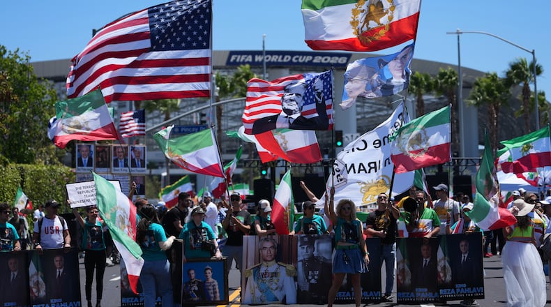 People protest outside Los Angeles Stadium before the World Cup Group G soccer match between Iran and New Zealand in Inglewood, Calif., near Los Angeles, Monday, June 15, 2026. (AP Photo/Jae C. Hong)