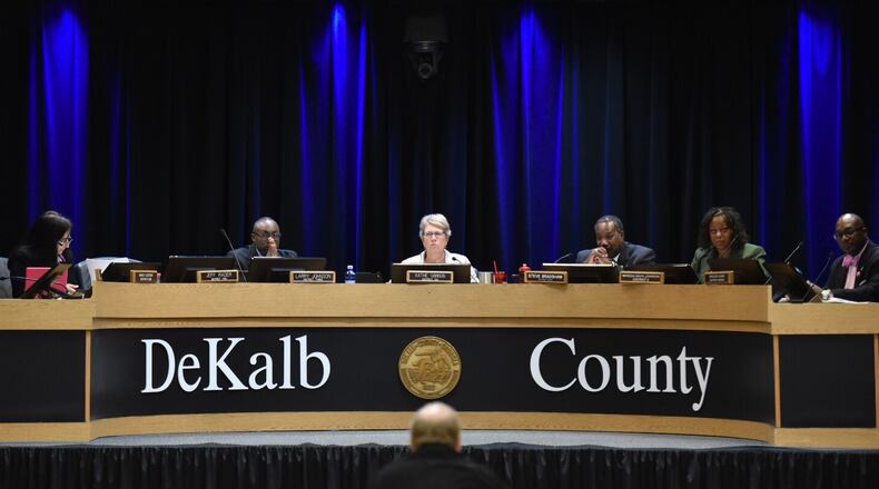 The DeKalb County Board of Commissioners voted Tuesday to put a sales tax increase on November's ballot. From left: Commissioners Nancy Jester, Larry Johnson, Kathie Gannon, Steve Bradshaw, Mereda Davis Johnson and Greg Adams. HYOSUB SHIN / Hyosub.Shin@ajc.com