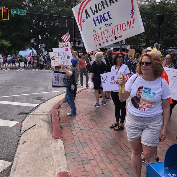 Protesters gathered in downtown Athens, Georgia for a "No Kings" rally on Saturday, June 14, 2025. (Jim Thompson for the AJC)