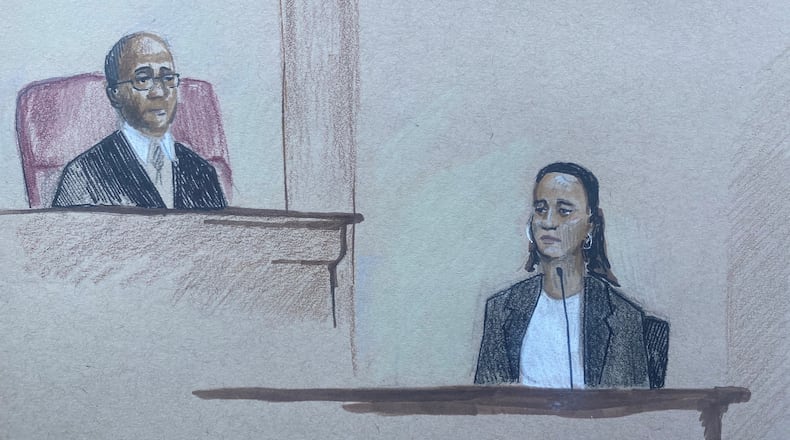 United States District Court Judge Steve C. Jones looks on in federal court in Atlanta Monday as witness Adrienne Richardson, an auditor with the U.S. Attorney's office, details how Mitzi Bickers came up with $300,000 in a matter of days in 2011 to help purchase a lakefront home.